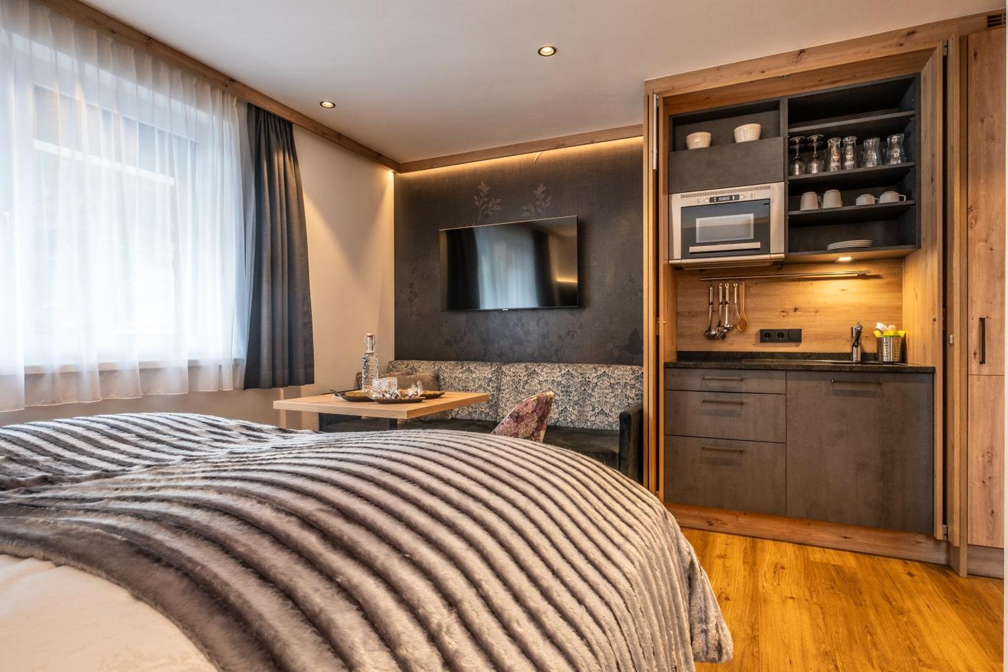 Dorfkrug Kaprun - Luxury Suites & Appartements By Sfl Экстерьер фото